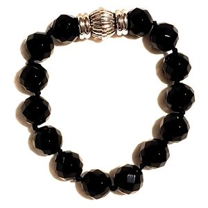 Black faceted stone bracelet. No markings. Magneti